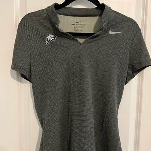 Nike golf polo with eagles logo. NFL licensed